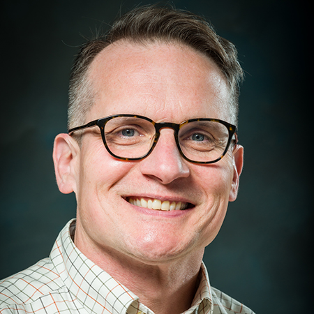 headshot of Joshua Baur